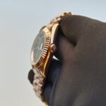 rolex-day-date-40mm-president-rose-gold-fluted-bezel-green-roman-dial-mens-watch-replica-syqgc.webp