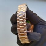rolex-day-date-40mm-president-rose-gold-fluted-bezel-green-roman-dial-mens-watch-replica-syqgc.webp