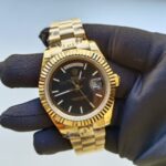rolex-day-date-40mm-yellow-gold-black-diagonal-motif-index-dial-fluted-bezel-president-bracelet-228238-replica-gzqos.webp