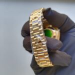 rolex-day-date-40mm-yellow-gold-black-diagonal-motif-index-dial-fluted-bezel-president-bracelet-228238-replica-gzqos.webp