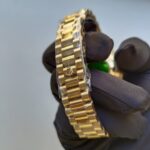 rolex-day-date-40mm-yellow-gold-silver-diagonal-motif-index-dial-fluted-bezel-president-bracelet-228238-replica-rmn1o.webp