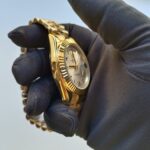 rolex-day-date-40mm-yellow-gold-silver-roman-dial-fluted-bezel-president-bracelet-228238-replica-tjvny.webp