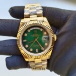 rolex-day-date-41mm-president-yellow-gold-fluted-bezel-shadow-green-diamond-dial-mens-watch-replica-hj9dm.jpg