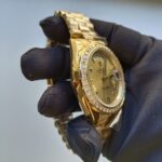 rolex-day-date-ii-yellow-gold-champagne-diamond-41mm-roman-dial-diamond-bezel-president-bracelet-watch-replica-1d6yp.webp