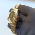 rolex-day-date-ii-yellow-gold-champagne-diamond-41mm-roman-dial-diamond-bezel-president-bracelet-watch-replica-1d6yp.webp