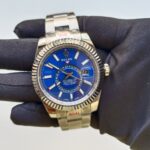 rolex-sky-dweller-stainless-steel-42mm-blue-index-dial-fluted-white-gold-bezel-oyster-bracelet-326934-replica-kwr61.webp