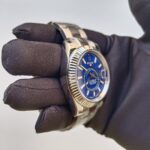rolex-sky-dweller-stainless-steel-42mm-blue-index-dial-fluted-white-gold-bezel-oyster-bracelet-326934-replica-kwr61.webp
