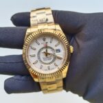 rolex-sky-dweller-white-dial-42mm-fluted-bezel-oyster-bracelet-yellow-gold-mens-watch-326938-replica-yk0ke.png