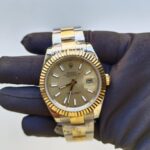 rolex-steel-and-yellow-gold-rolesor-datejust-41mm-fluted-bezel-champagne-index-dial-oyster-bracelet-replica-ta0g9.jpg