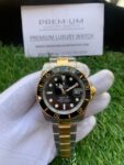 rolex-submariner-41mm-black-dial-stainless-steel-and-yellow-gold-bracelet-automatic-mens-watch-replica-tnc4e.webp