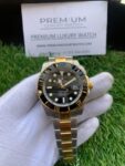 rolex-submariner-41mm-black-dial-stainless-steel-and-yellow-gold-bracelet-automatic-mens-watch-replica-tnc4e.webp